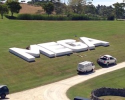 Mega launch illuminated sign