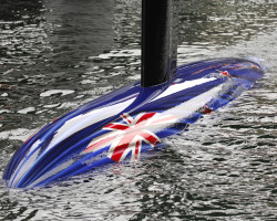 The bulb of Emirates Team New Zealand`s NZL92 emerges from the water as the boat is lifted out. Racing was cancelled on the Juliet course today. 27/4/2007