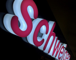 Schweigen illuminated signage