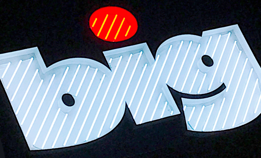 BIG’s unique neon sign graphic