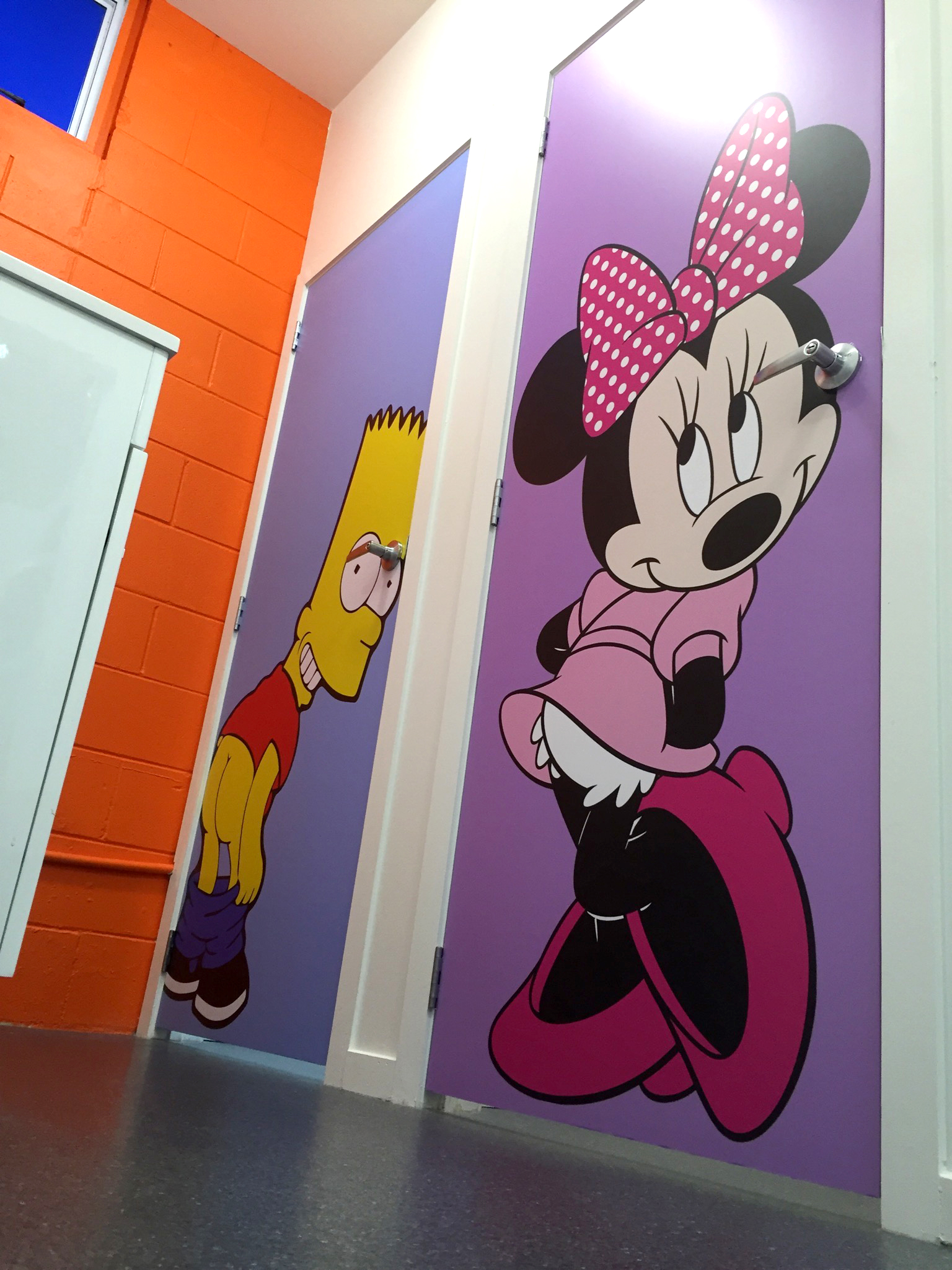Bart Simpson and Minnie Mouse male and female toilet differentiation wraps on toilet door