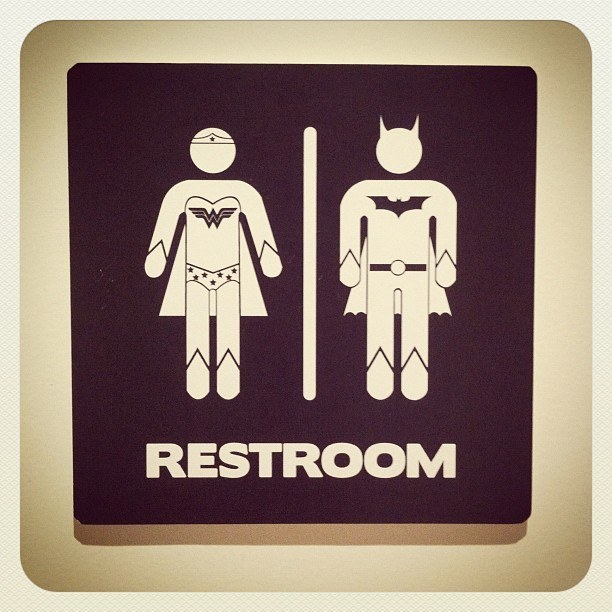 Wonder Woman and Batman male and female indicators for toilet signage