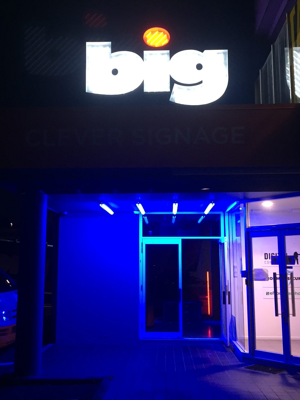 Blue lighting outside the BIG Signage front door