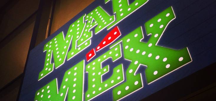 Mad Mex green and red signage with light up lettering
