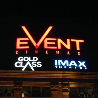 Event Cinemas, IMAX, and Gold Class light up signs shown at night