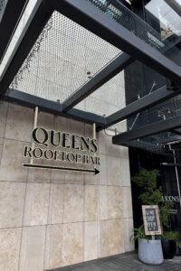 Queens Rooftop Bar illuminated signage